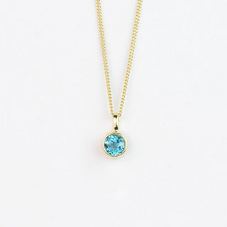 Gold 5mm Swiss Blue Topaz Andromeda Pendant