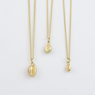 Gold Cowrie Pendants