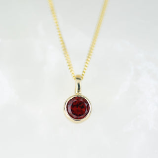 Gold 5mm Garnet Andromeda Pendant